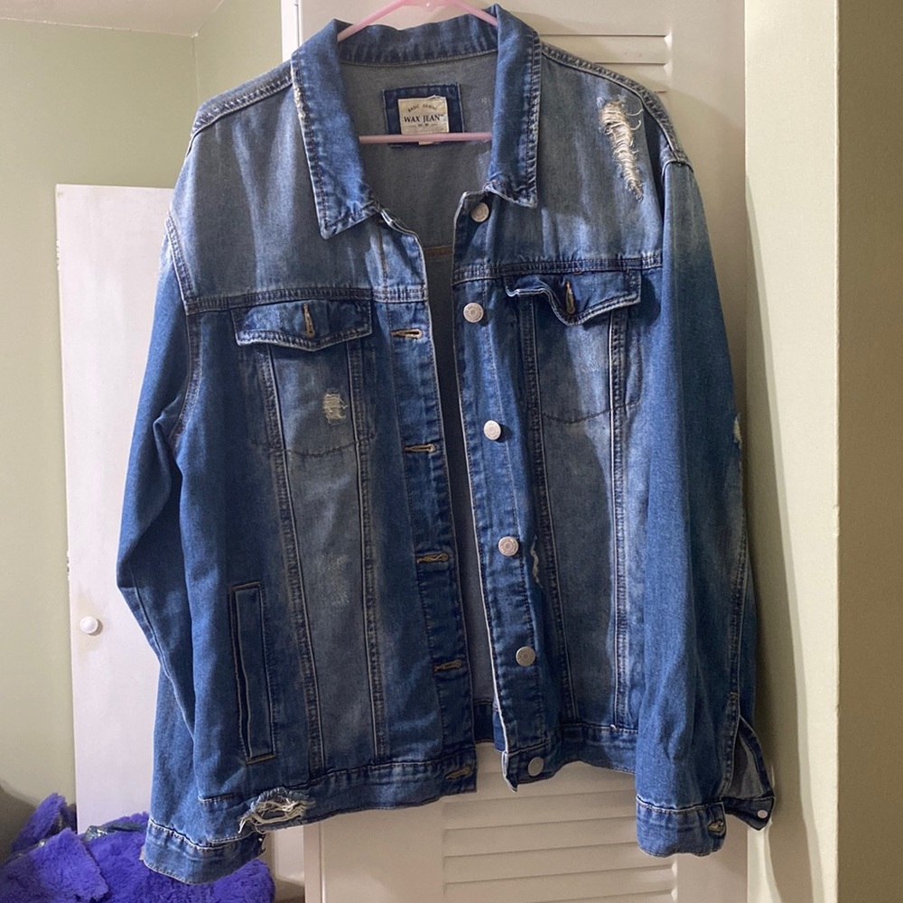 Distressed denim jacket